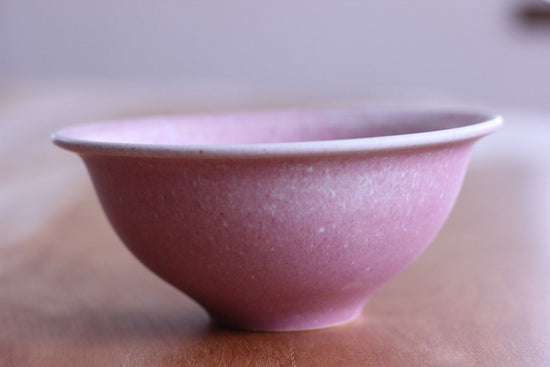 round earthenware pot (used as a decanter)