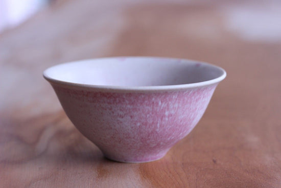 round earthenware pot (used as a decanter)