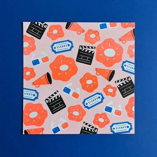 Film and orange flower postcard