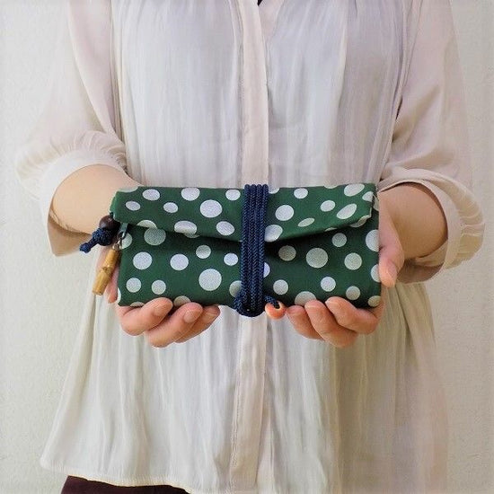 Kyoto Cotton ox green color fabric Roll bag with polka dots, silver