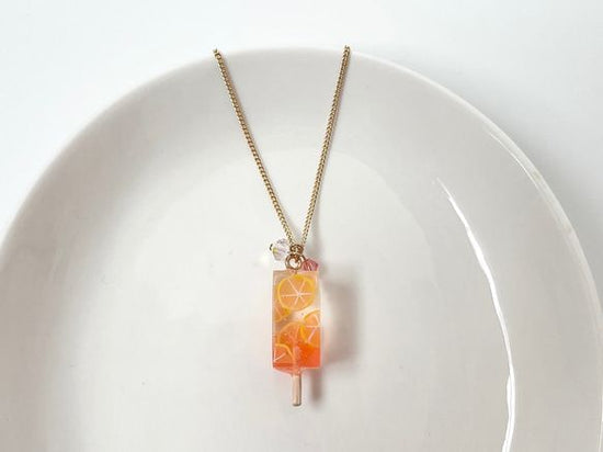 Pink grapefruit gradient popsicle necklace