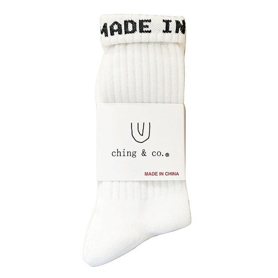 "Made in China, white socks, three-pair set."