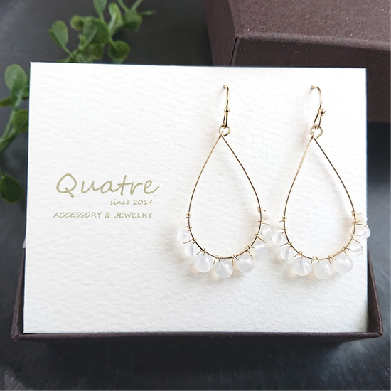 White chalcedony pierced earrings muse