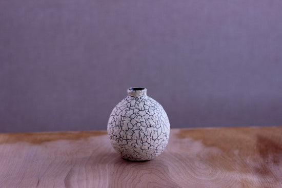 Vase in the shape of a sake cup