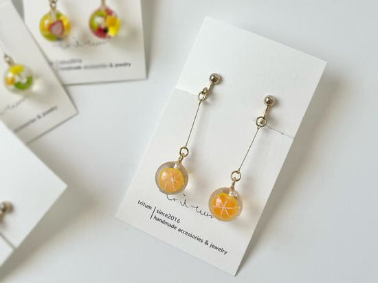 Pink grapefruit Clip-on earrings by Kowloon Ball