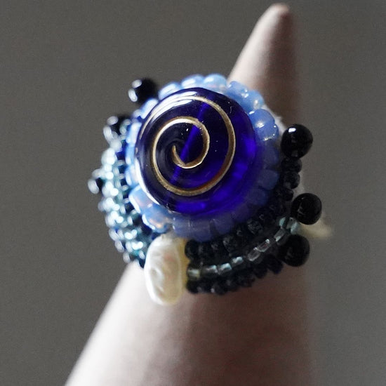 Talkative ring 44 free size bead embroidery ring round vortex blue