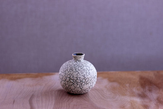 Vase in the shape of a sake cup