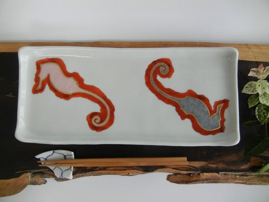 Long rectangular plate with dragon design