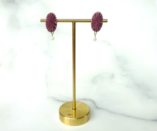 Oval pierce/earring of carved moyo ( purple)