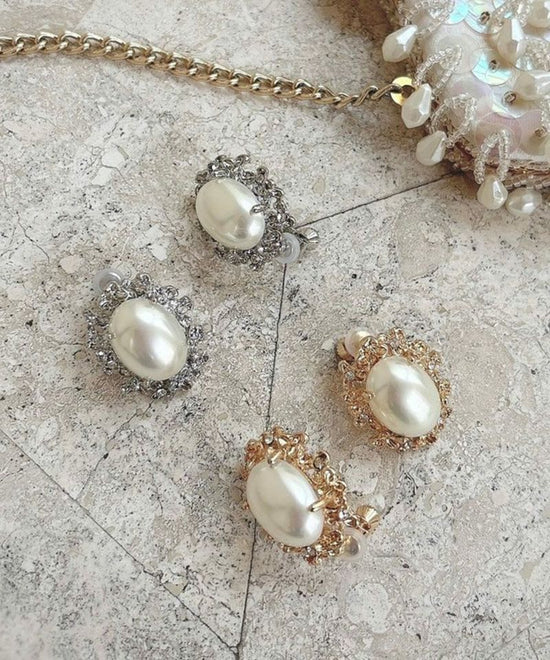 Pearl Vijoux relief Clip-on earrings/an another angelus [51BB04a004].