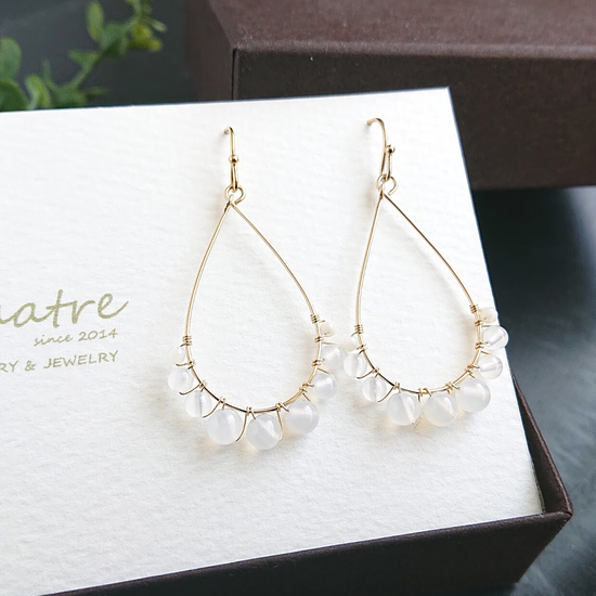 White chalcedony pierced earrings muse