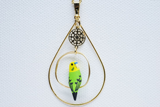 Pendant with Budgie (Green) with one Rider and Surrounding Accessory