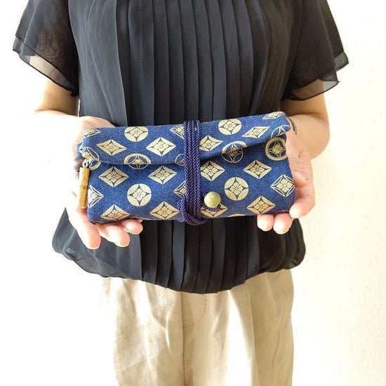 Kyoto Michu purse roll bag made of denim navy blue cloth, cloisonne, gold