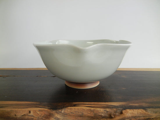 small bowl with flower design on three sides