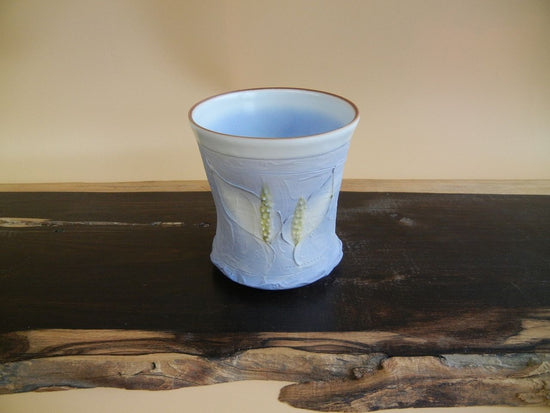 Kiyomizu ware of a blue skunk cabbage cup