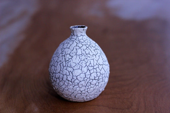 Vase in the shape of a sake cup