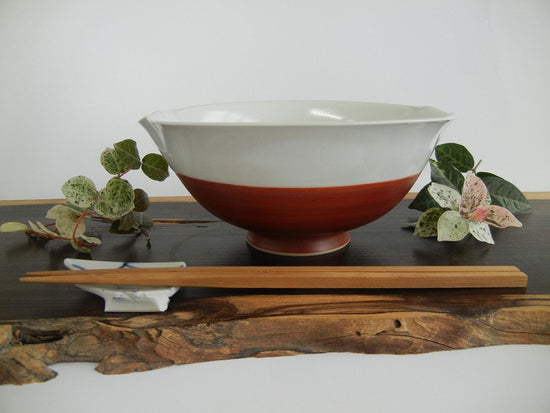 Small oval bowl, reddish brown and black