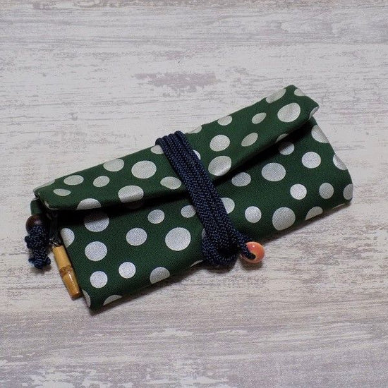 Kyoto Cotton ox green color fabric Roll bag with polka dots, silver