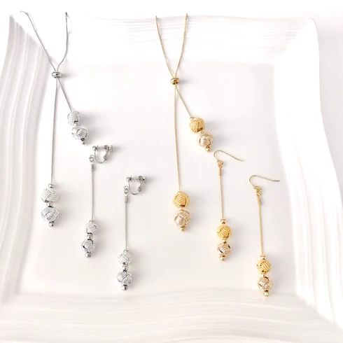 Set of Y-shaped long necklace with ball-shaped knot, pierced earrings Clip-on earrings