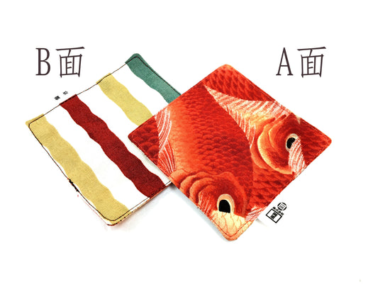 HAURA REVERSIBLE COASTER with a striped pattern and a sea bream design