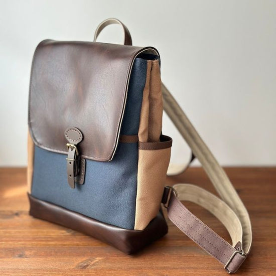 Canvas and synthetic leather backpack (dark blue and dark beige)