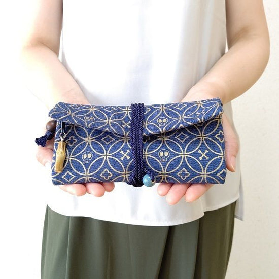Kyoto Michu wallet, rolled bag made of denim, gold with skull and crossbones cloisonne