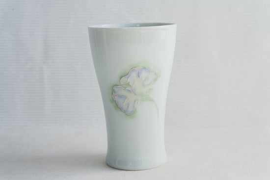 Pale celadon beer glass with floral design