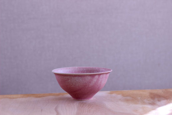 round earthenware pot (used as a decanter)