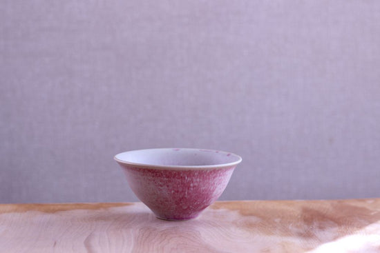 round earthenware pot (used as a decanter)