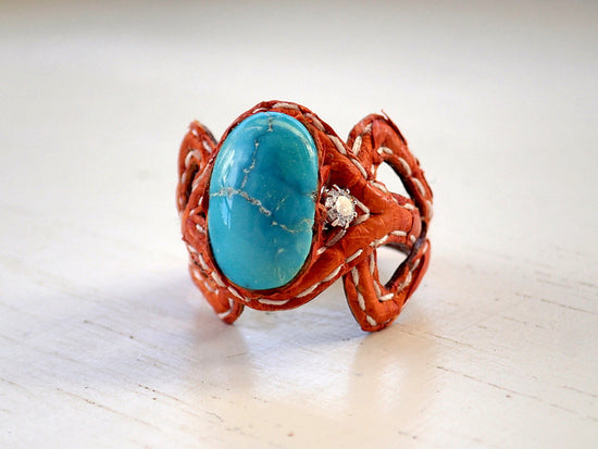 Orange python and cowhide turquoise ring